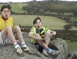 Paul Oakley and Tao Burgess try out a rock seat near Mel Tor